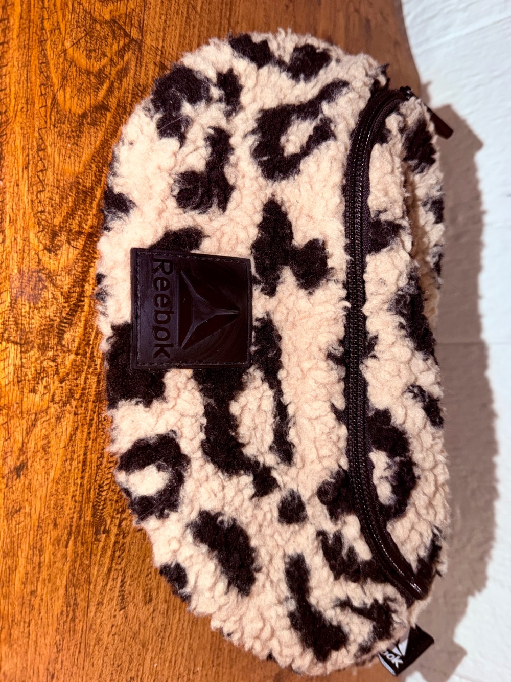 Reebok Sherpa Leopard Print Fanny Pack in Black & brown